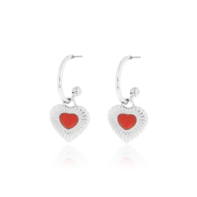 Silver coloured earrings with red heart charm